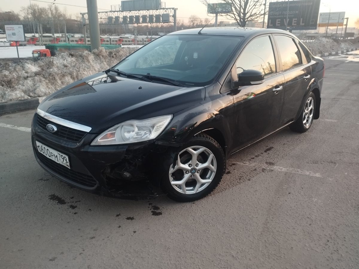 Автомобиль Ford Focus II [рестайлинг] 1.6 AT (101 л.с.) Comfort Чёрный 2010 с пробегом 300 499 км