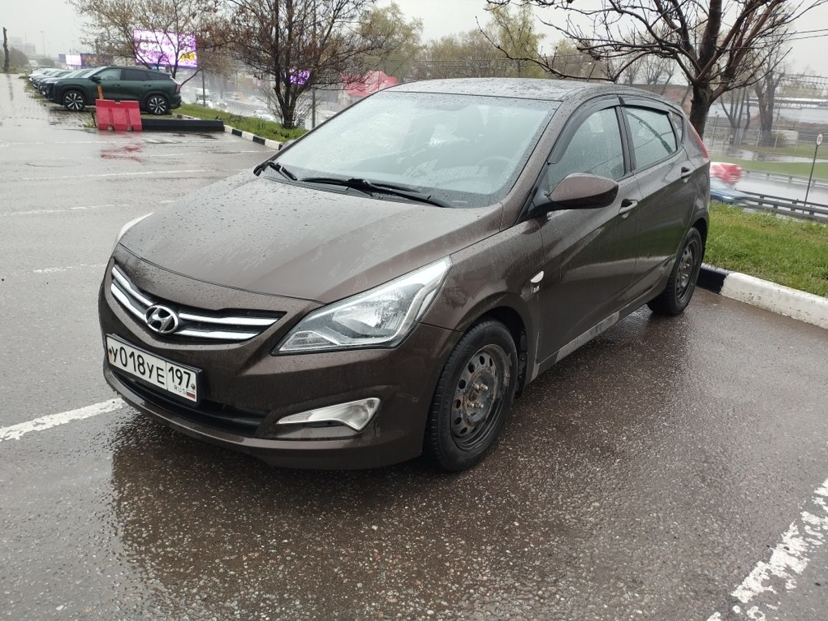 Hyundai Solaris I [рестайлинг] 1.6 AT (123 л.с.) Active Коричневый 2015 с пробегом 102 508 км