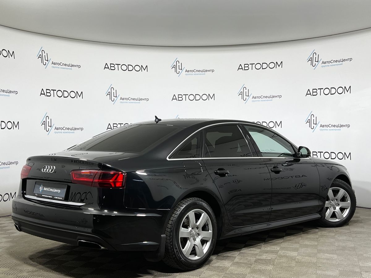 Автомобиль Audi A6 IV (C7) [рестайлинг] 1.8 AMT (190 л.с.) Business Чёрный 2016 с пробегом 154 382 км