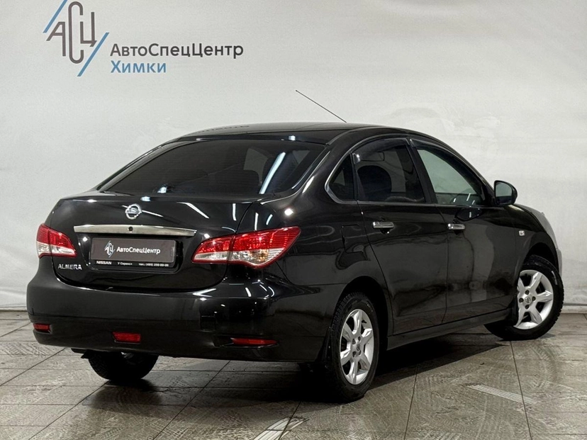 Автомобиль Nissan Almera III поколение (G15) 1.6 AT (102 л.с.) Comfort A/C Чёрный 2015 с пробегом 96 000 км