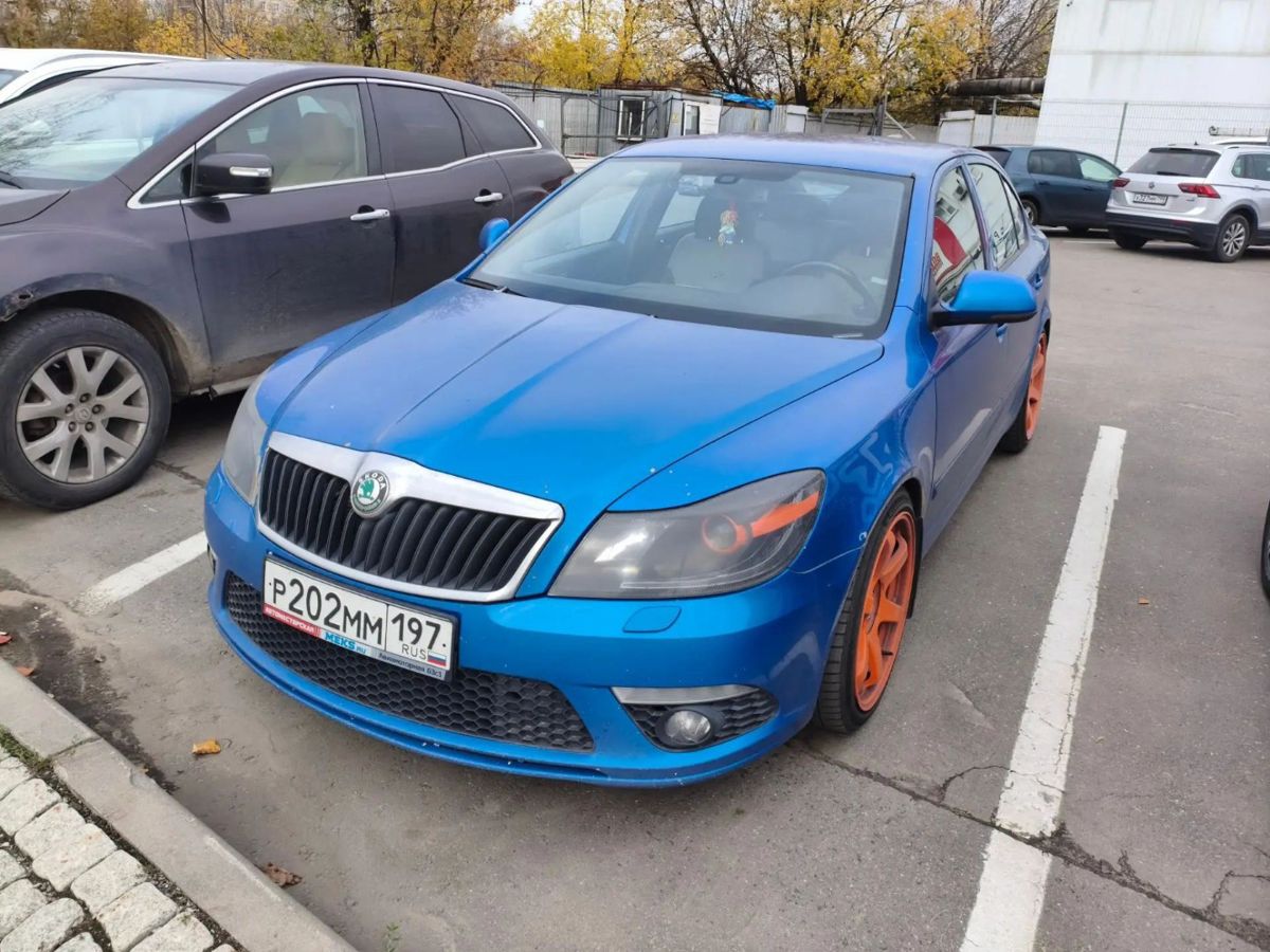 Skoda Octavia RS II (A5) [рестайлинг] 2.0 AMT (200 л.с.) RS Синий 2012 с пробегом 321 492 км