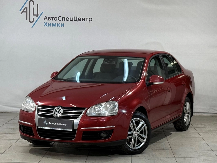 Автомобиль Volkswagen Jetta V поколение 1.6 AT (102 л.с.) Base Красный 2008 с пробегом 232 000 км