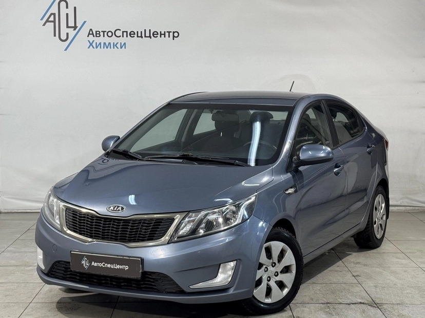 Автомобиль Kia Rio III поколение 1.6 4AT (123 л.с.) Luxe Синий 2012 с пробегом 144 200 км