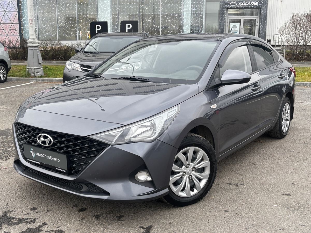 Автомобиль Hyundai Solaris II [рестайлинг] 1.6 MT (123 л.с.) Comfort + Light + Winter + Advanced Серый 2021 с пробегом 126 000 км