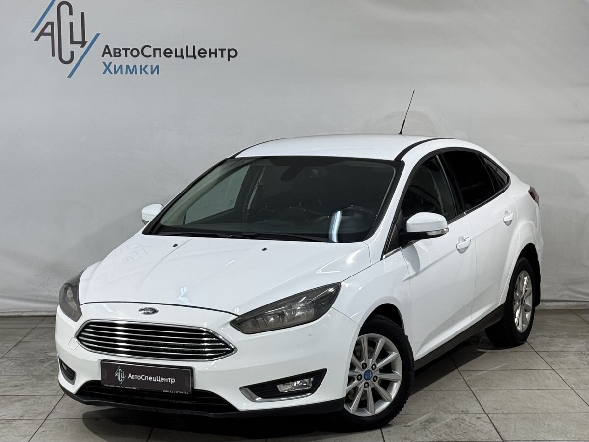 Автомобиль Ford Focus III [рестайлинг] 1.5 AT (150 л.с.) Titanium Белый 2015 с пробегом 178 000 км