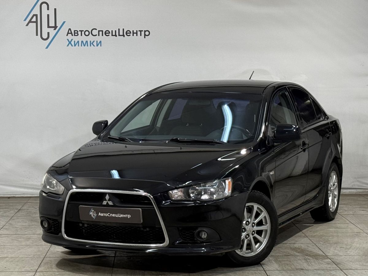 Автомобиль Mitsubishi Lancer X [1-й рестайлинг] 1.6 MT (117 л.с.) Invite Чёрный 2013 с пробегом 169 000 км