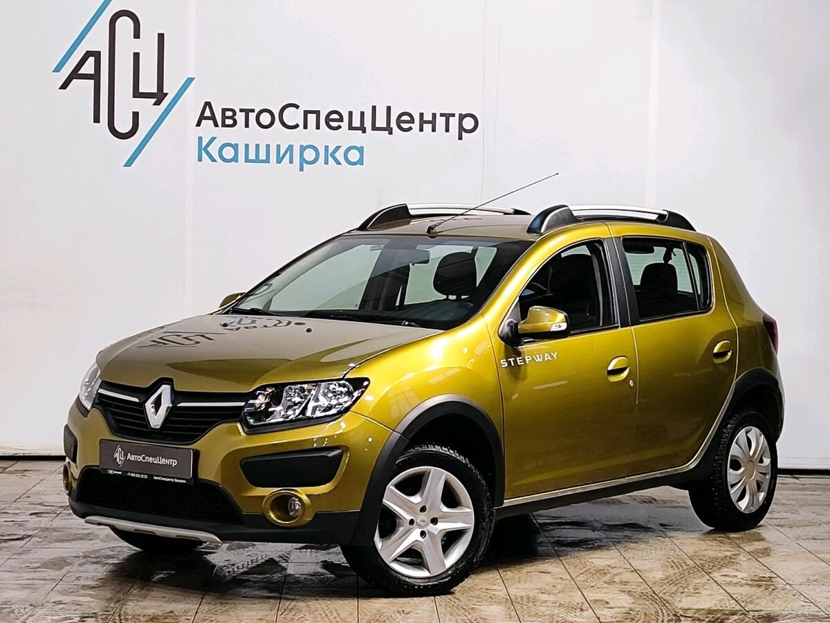 Автомобиль Renault Sandero II поколение 1.6 MT (102 л.с.) Base Золотой 2016 с пробегом 118 758 км