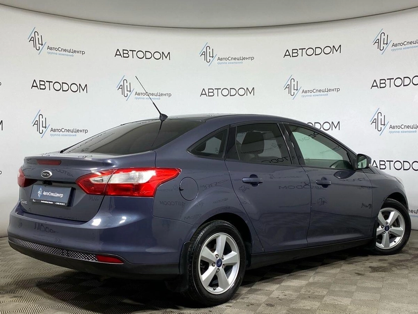 Автомобиль Ford Focus III поколение 1.6 MT (125 л.с.) Trend Серый 2011 с пробегом 213 000 км