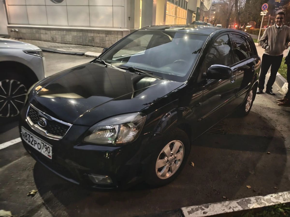 Kia Rio II [рестайлинг] 1.4 AT (95 л.с.) Prestige Чёрный 2011 с пробегом 91 543 км