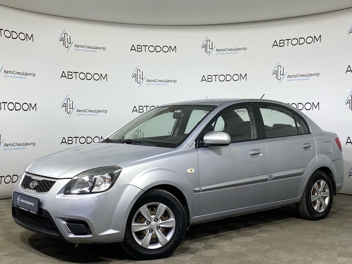 Автомобиль Kia Rio II [рестайлинг] 1.4 MT (95 л.с.) Comfort Серый 2011 с пробегом 261 778 км