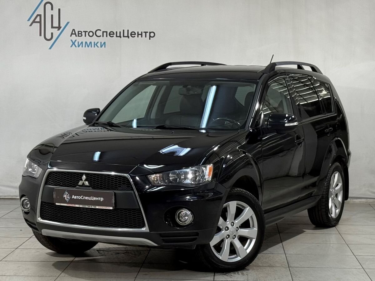 Mitsubishi Outlander II [рестайлинг] 2.4 CVT 4WD (170 л.с.) Instyle Чёрный 2012 с пробегом 123 000 км