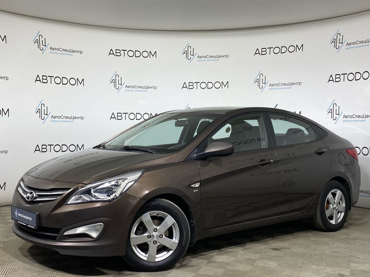 Hyundai Solaris I [рестайлинг] 1.6 AT (123 л.с.) Elegance Коричневый 2015 с пробегом 261 740 км