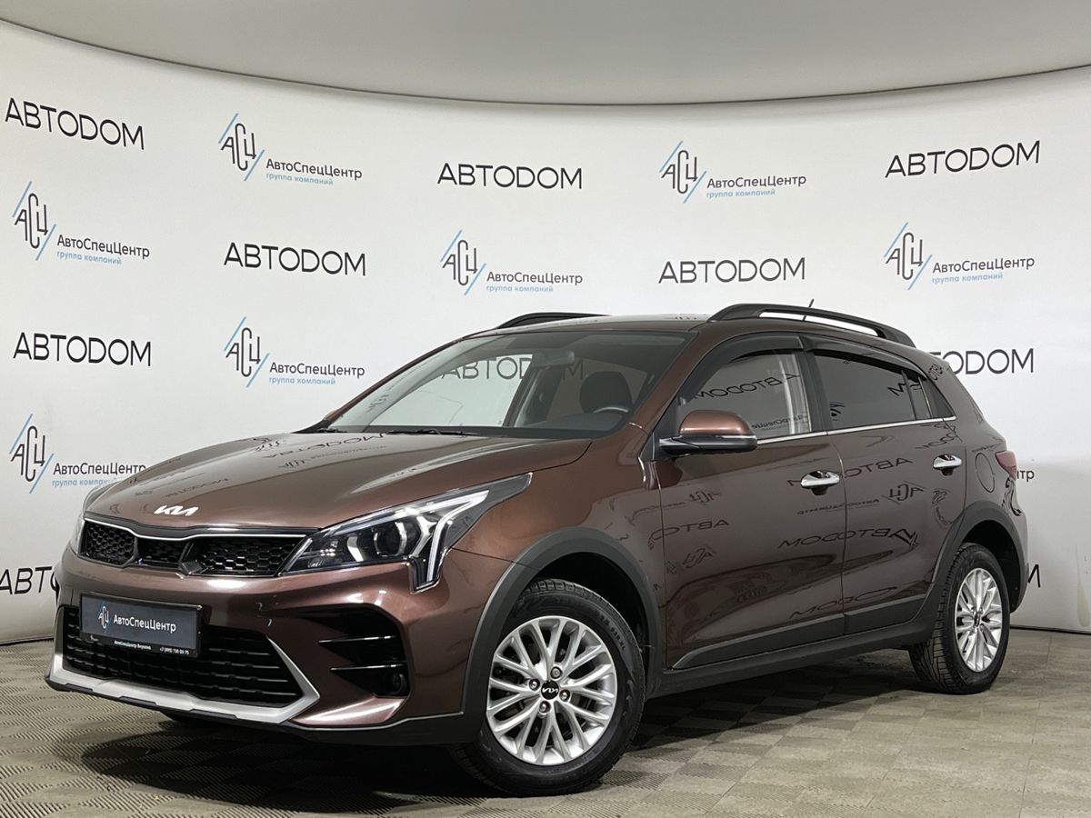 Автомобиль Kia Rio IV [рестайлинг] 1.6 AT (123 л.с.) Luxe Коричневый 2021 с пробегом 76 284 км
