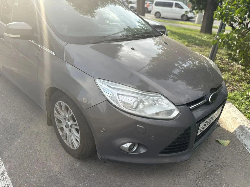 Ford Focus III поколение 2.0 AMT (150 л.с.) Titanium Серый 2012 с пробегом 234 758 км
