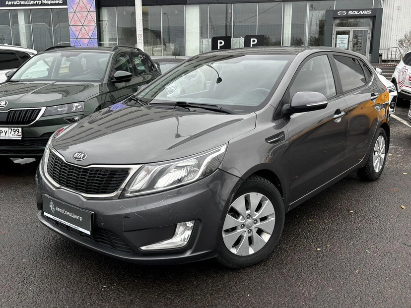 Автомобиль Kia Rio III поколение 1.6 4AT (123 л.с.) Prestige Серый 2013 с пробегом 139 000 км