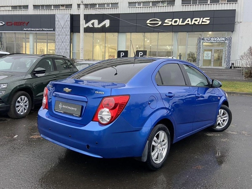 Автомобиль Chevrolet Aveo II поколение (T300) 1.6 AT (115 л.с.) LT Синий 2013 с пробегом 124 500 км