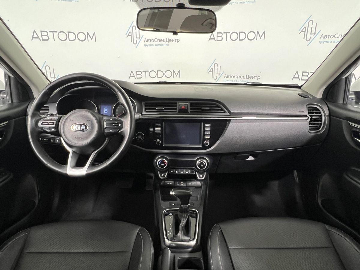 Автомобиль Kia Rio IV поколение 1.6 AT (123 л.с.) Premium Белый 2018 с пробегом 153 979 км