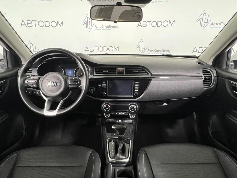 Автомобиль Kia Rio IV поколение 1.6 AT (123 л.с.) Premium Белый 2018 с пробегом 153 979 км