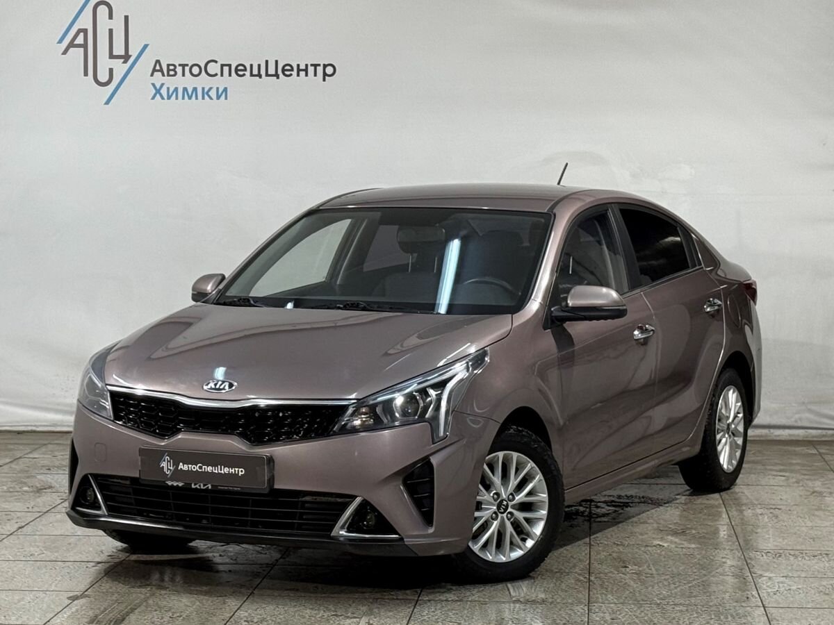 Автомобиль Kia Rio IV [рестайлинг] 1.6 AT (123 л.с.) Prestige Коричневый 2021 с пробегом 110 000 км