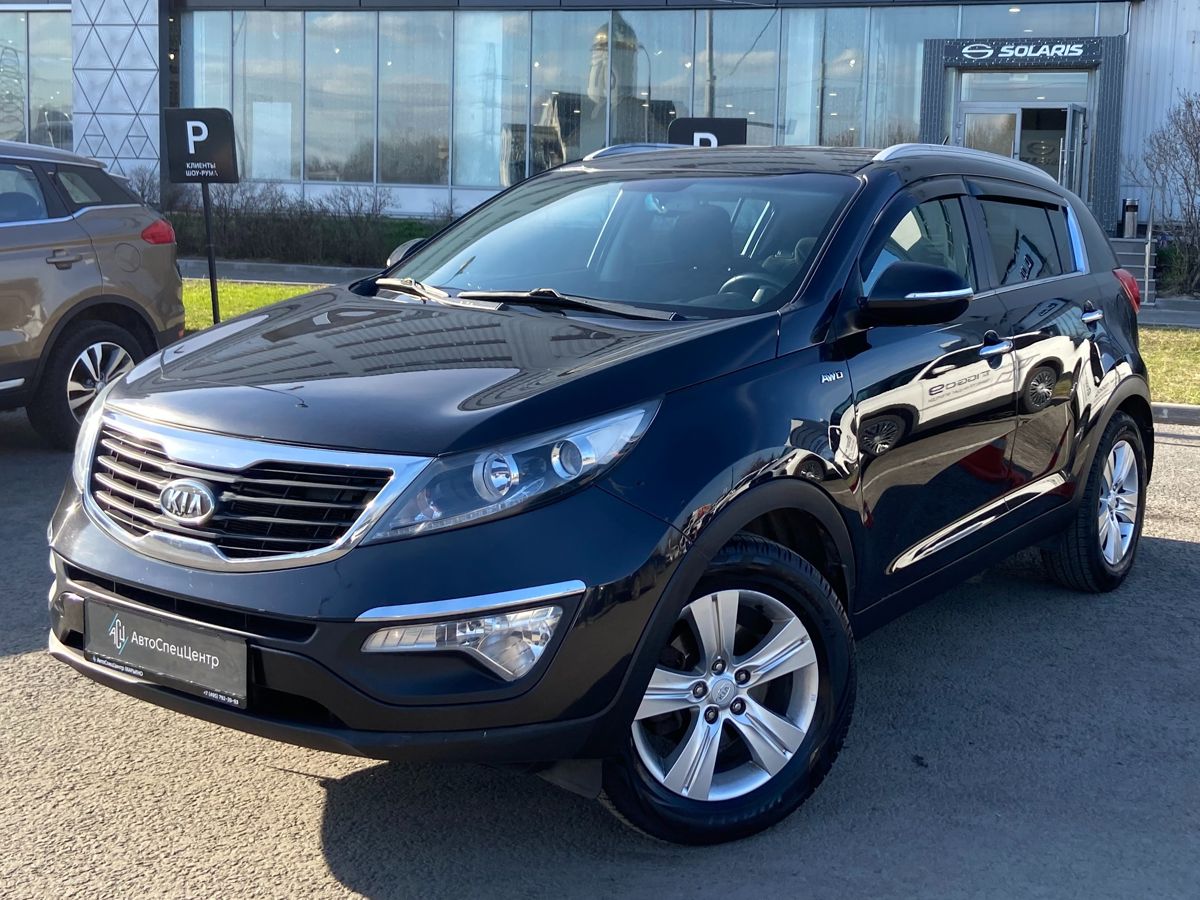 Автомобиль Kia Sportage III поколение 2.0 AT 4WD (150 л.с.) Luxe Чёрный 2012 с пробегом 171 522 км