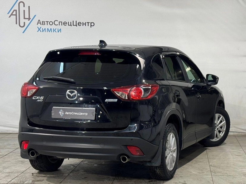 Автомобиль Mazda CX-5 I поколение 2.0 AT 4WD (150 л.с.) Active Чёрный 2014 с пробегом 125 000 км