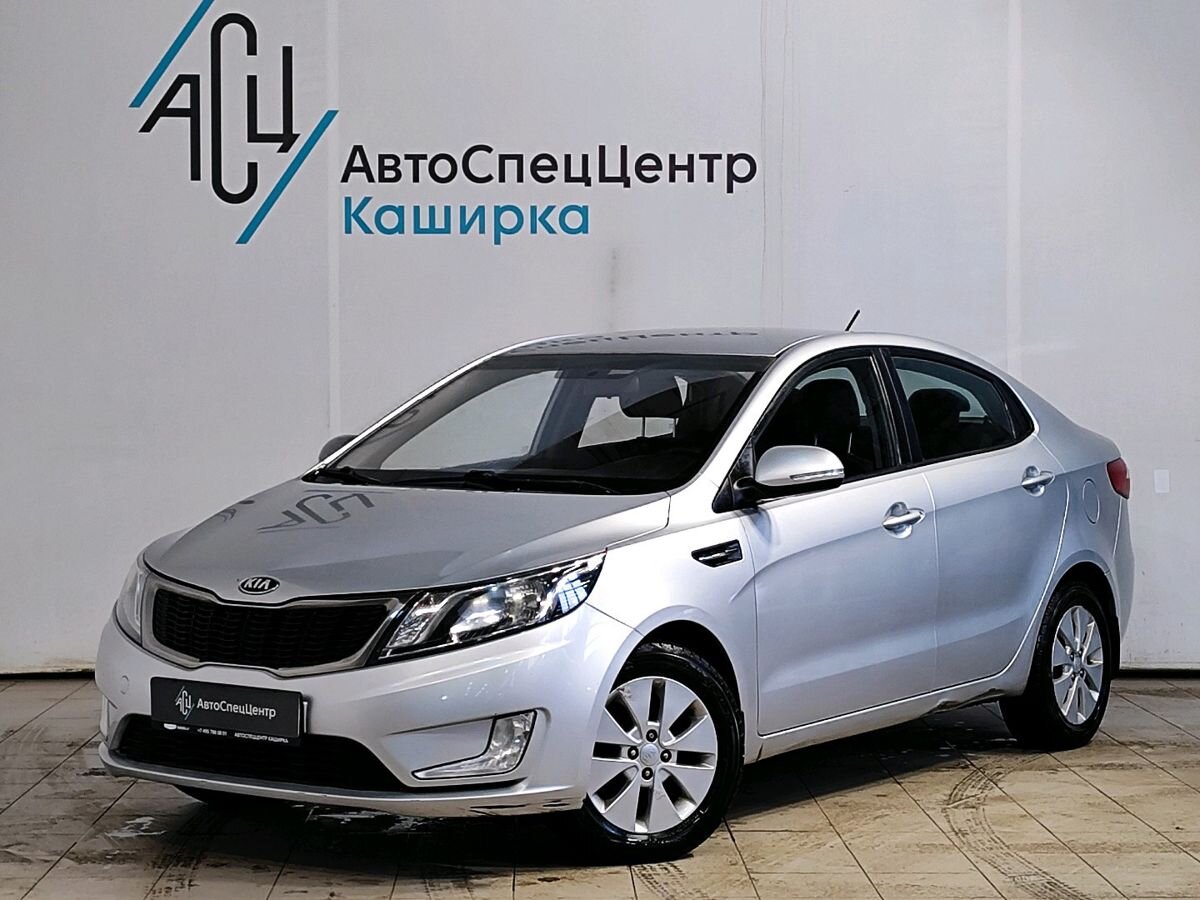 Kia Rio III поколение 1.6 5MT (123 л.с.) Prestige Серебристый 2013 с пробегом 123 850 км