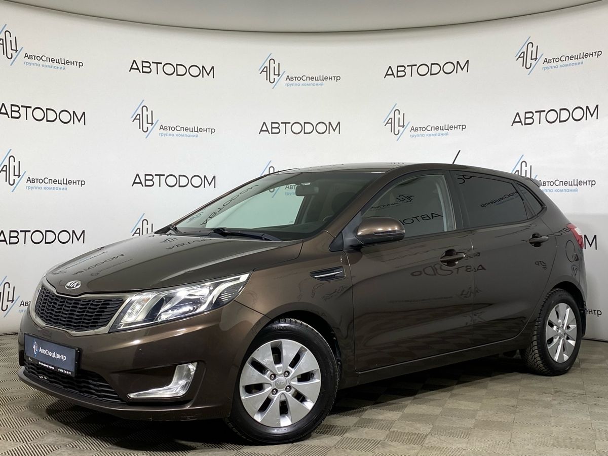Автомобиль Kia Rio III поколение 1.6 6AT (123 л.с.) Prestige Коричневый 2014 с пробегом 81 304 км