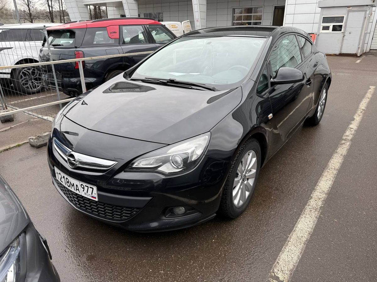 Автомобиль Opel Astra IV (J) [рестайлинг] 1.4 AT (140 л.с.) Enjoy Чёрный 2014 с пробегом 129 540 км