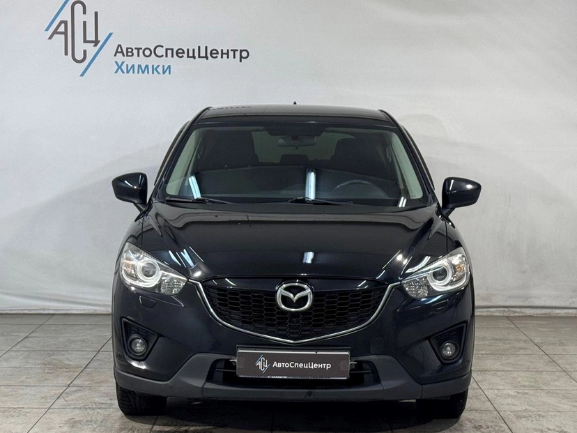 Автомобиль Mazda CX-5 I поколение 2.0 AT 4WD (150 л.с.) Active Чёрный 2014 с пробегом 125 000 км