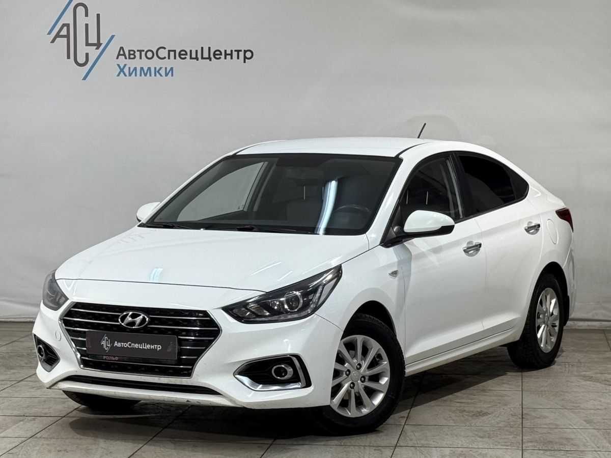 Автомобиль Hyundai Solaris II поколение 1.6 MT (123 л.с.) Elegance Белый 2017 с пробегом 148 422 км
