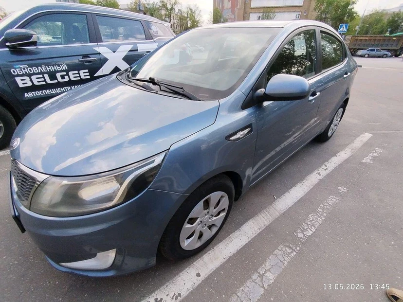 Kia Rio III поколение 1.6 4AT (123 л.с.) Luxe Голубой 2013 с пробегом 220 916 км
