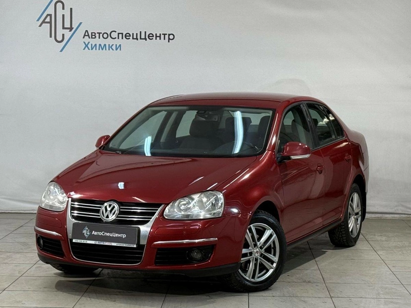 Автомобиль Volkswagen Jetta V поколение 1.6 AT (102 л.с.) Base Красный 2008 с пробегом 232 000 км