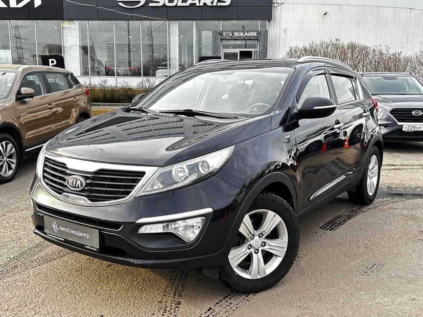 Автомобиль Kia Sportage III поколение 2.0 AT 4WD (150 л.с.) Luxe Чёрный 2012 с пробегом 171 522 км