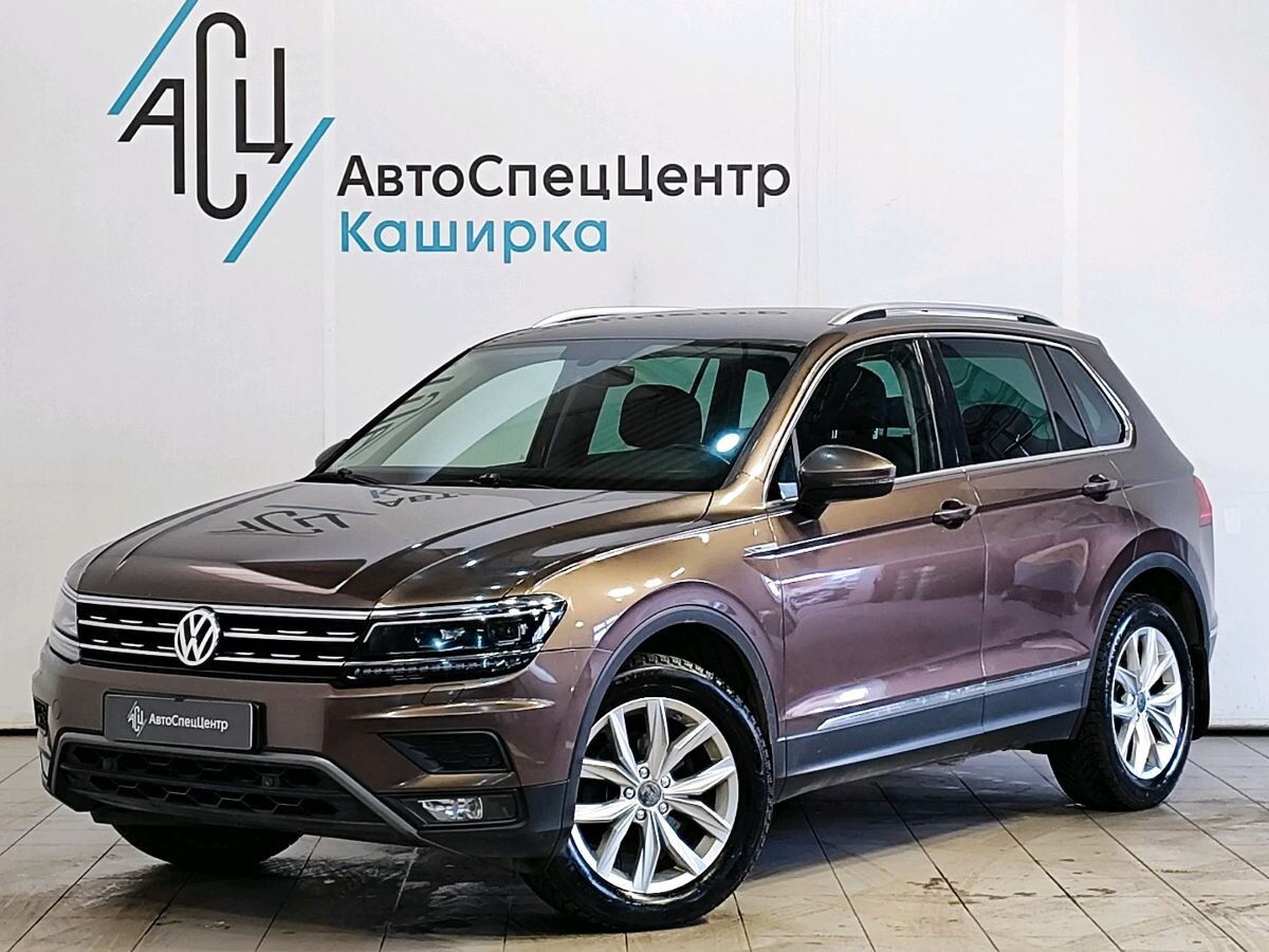 Автомобиль Volkswagen Tiguan II поколение 1.4 AMT 4WD (150 л.с.) Offroad Коричневый 2017 с пробегом 172 418 км