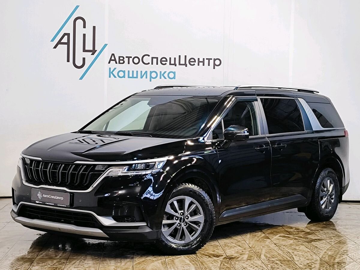 Автомобиль Kia Carnival IV поколение 2.2d AT (199 л.с.) Luxe (2021) Чёрный 2021 с пробегом 174 808 км
