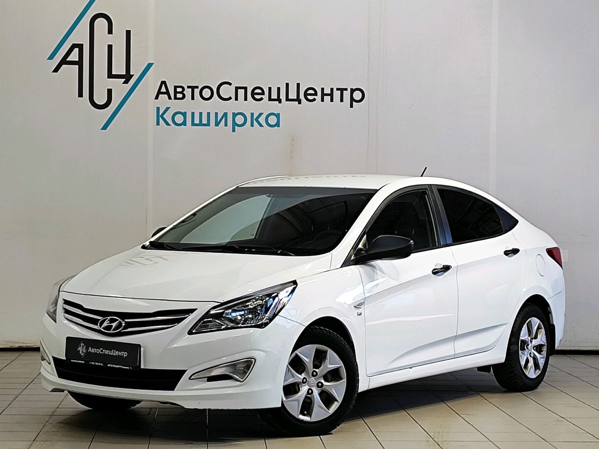 Автомобиль Hyundai Solaris I [рестайлинг] 1.6 AT (123 л.с.) Comfort Белый 2015 с пробегом 87 650 км