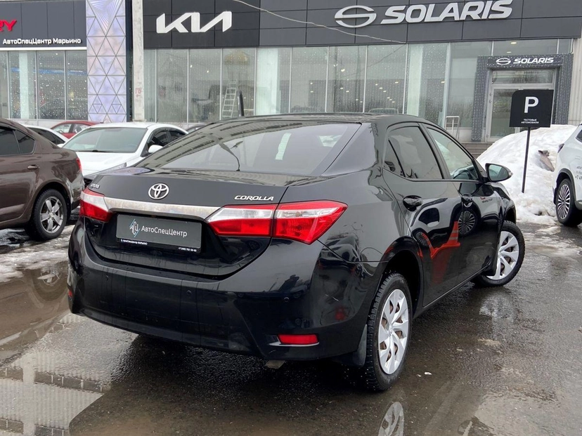 Автомобиль Toyota Corolla XI (E160/E170) 1.6 CVT (122 л.с.) Классик Чёрный 2016 с пробегом 158 000 км