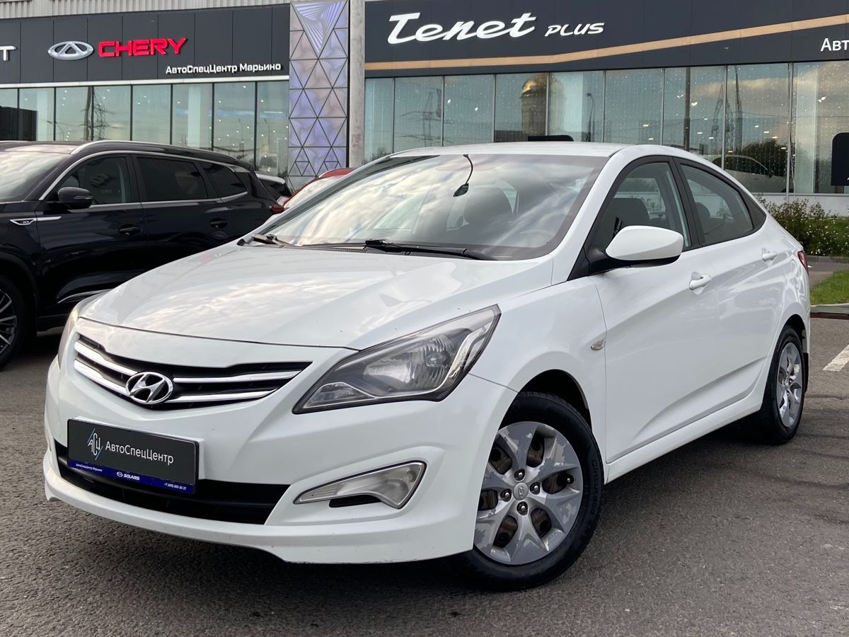 Hyundai Solaris I [рестайлинг] 1.4 AT (107 л.с.) Elegance Белый 2015 с пробегом 195 000 км