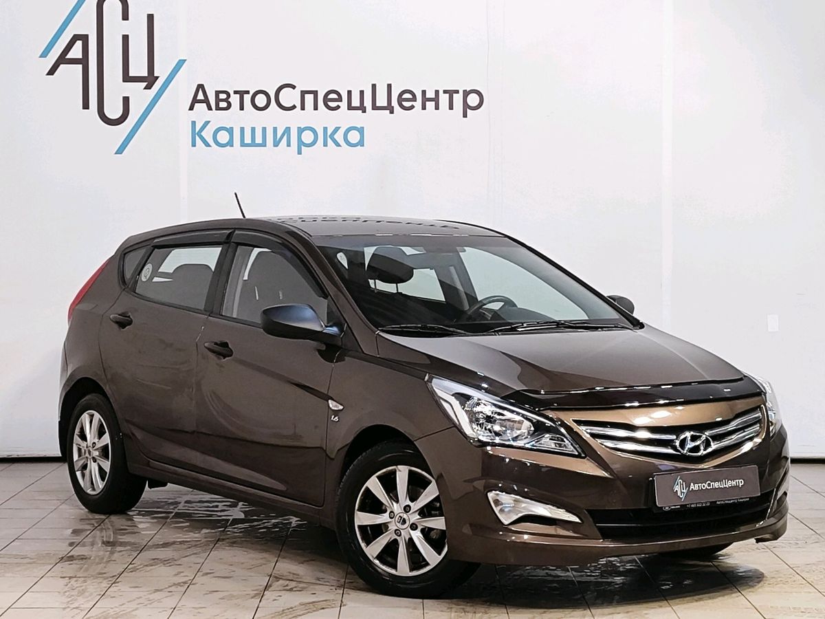 Автомобиль Hyundai Solaris I поколение 1.6 AT (123 л.с.) Classic Коричневый 2014 с пробегом 26 969 км