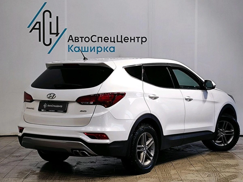 Автомобиль Hyundai Santa Fe III поколение (DM) 2.4 AT 4WD (175 л.с.) Dynamic Белый 2015 с пробегом 125 990 км