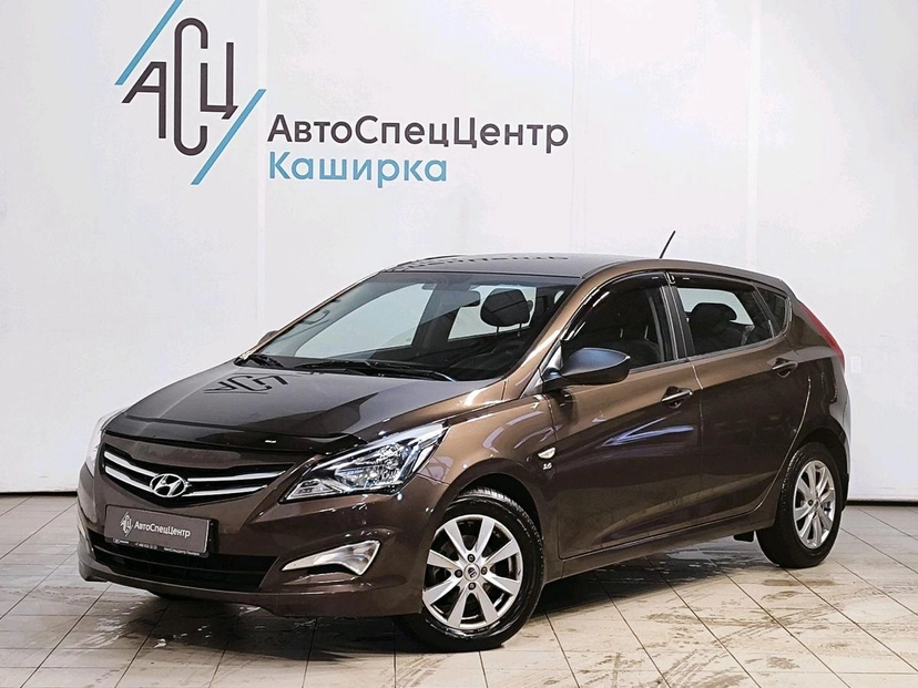 Автомобиль Hyundai Solaris I поколение 1.6 AT (123 л.с.) Classic Коричневый 2014 с пробегом 26 969 км